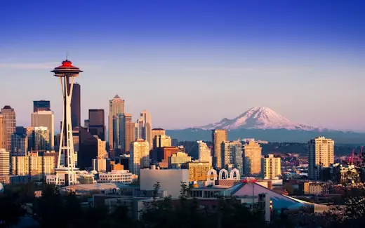 The Space Needle with Mount Rainier behind the Seattle skyline