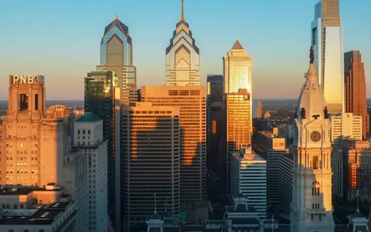 Philadelphia City Hall and the downtown skyline at sunset
